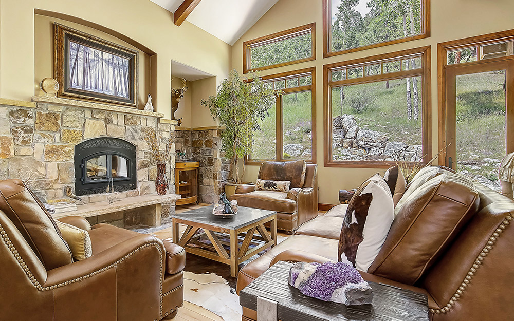 Rockies mountain home with rock fireplace 